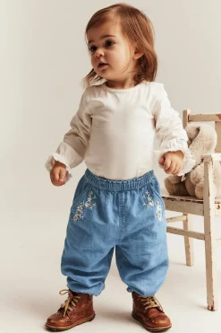 Denimhousut kukkabrodeerauksilla | Vaalea denim | Vauvat | Newbie