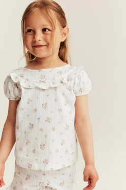 Kukallinen röyhelösomisteinen pyjama | Luonnonvalkoinen | Lapset | Newbie
