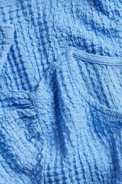 Lyhythihainen tekstuuripintainen paita | Sininen | Naiset | Kappahl