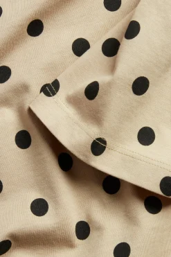 Puuvillaa oleva pistekuvioinen pitkä t-paita. | Beige | Naiset | Kappahl
