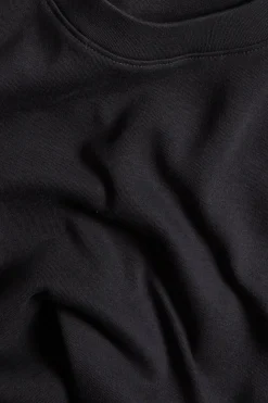 Puuvillaa oleva pitkähihainen t-paita | Musta | Naiset | Kappahl
