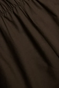 Puuvillapopliinishortsit, joissa on brodeerattu reuna