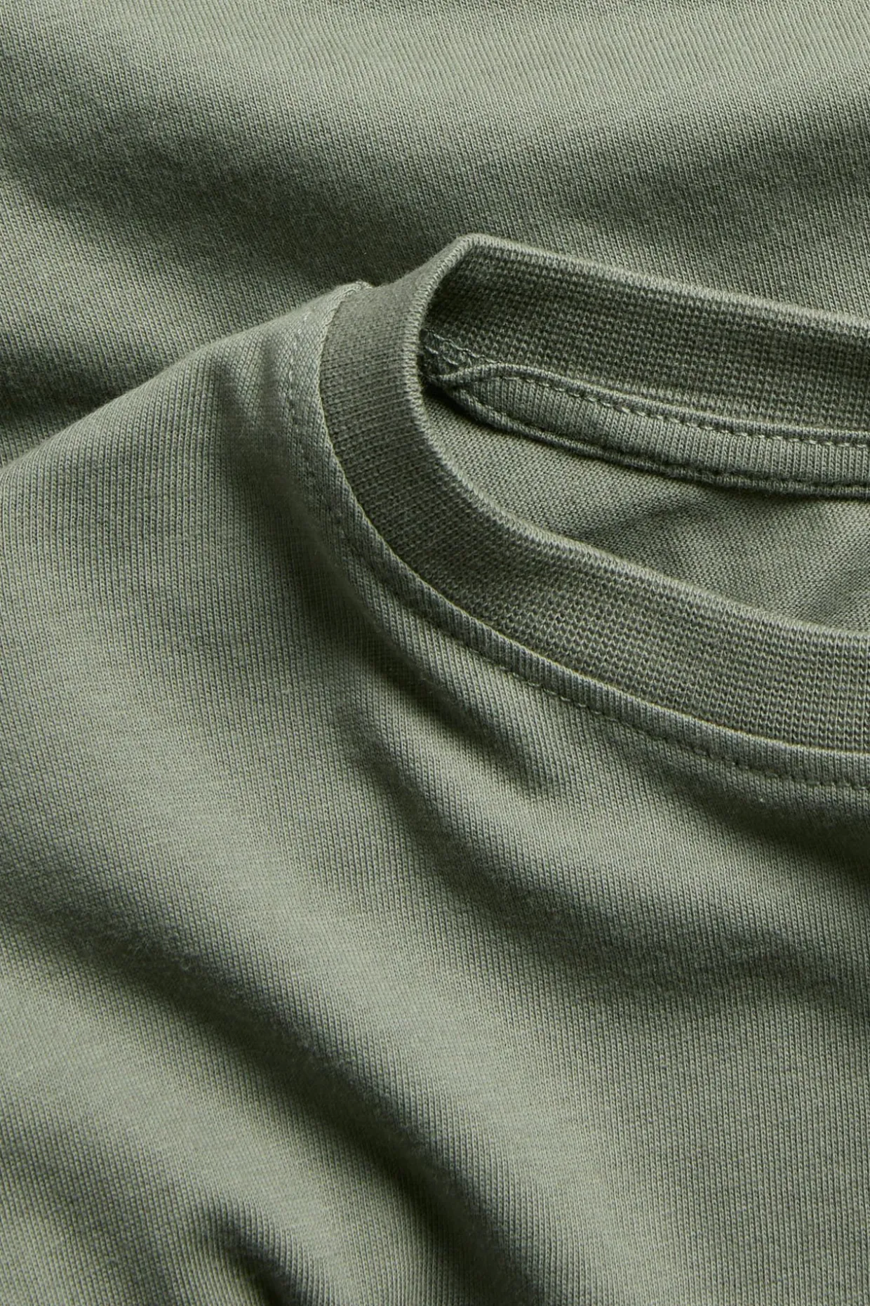Puuvillatrikoota oleva pitkähihainen oversize-t-paita. | Vihreä | Lapset | Kappahl
