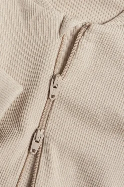 Ribattu haalariasu, jossa on käännettävät resorit. | Beige | Vauvat | Kappahl
